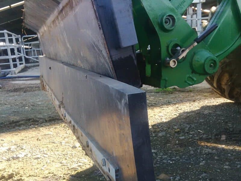 scraper rubber installed on a front end loader