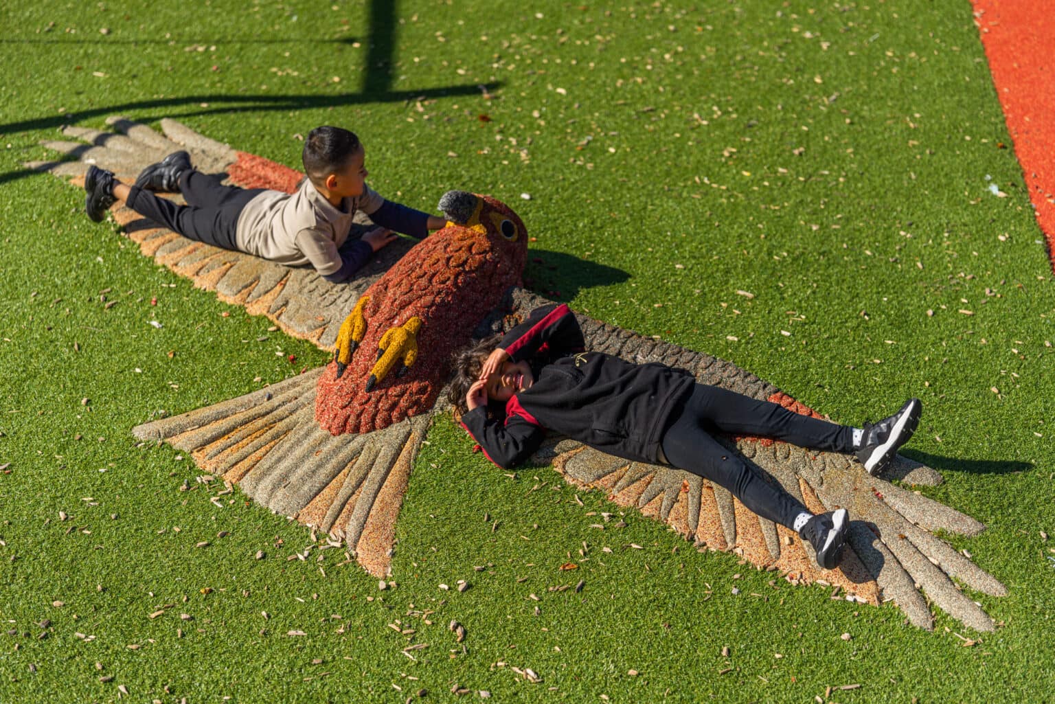 Small design items can be great in thematic playground design, such as this native bird.